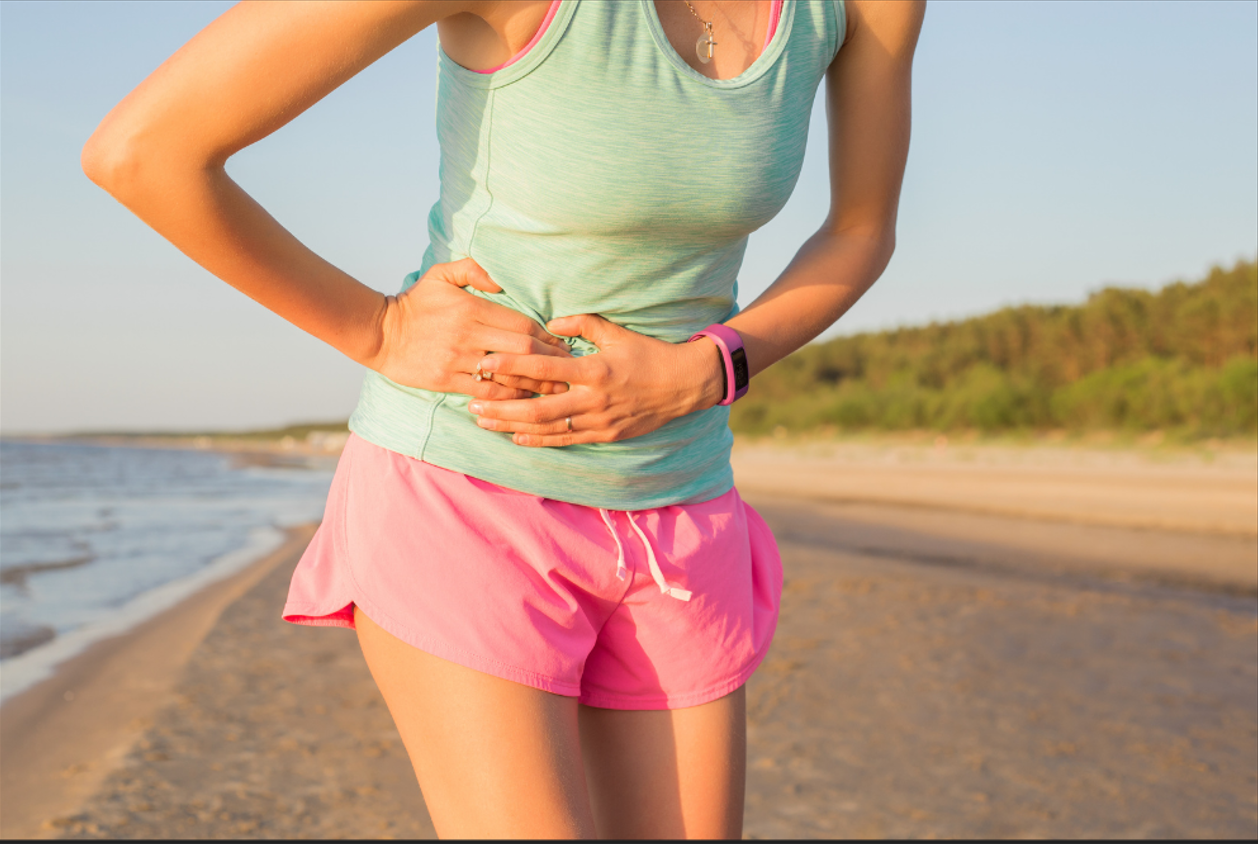 Runner holding stomach 1